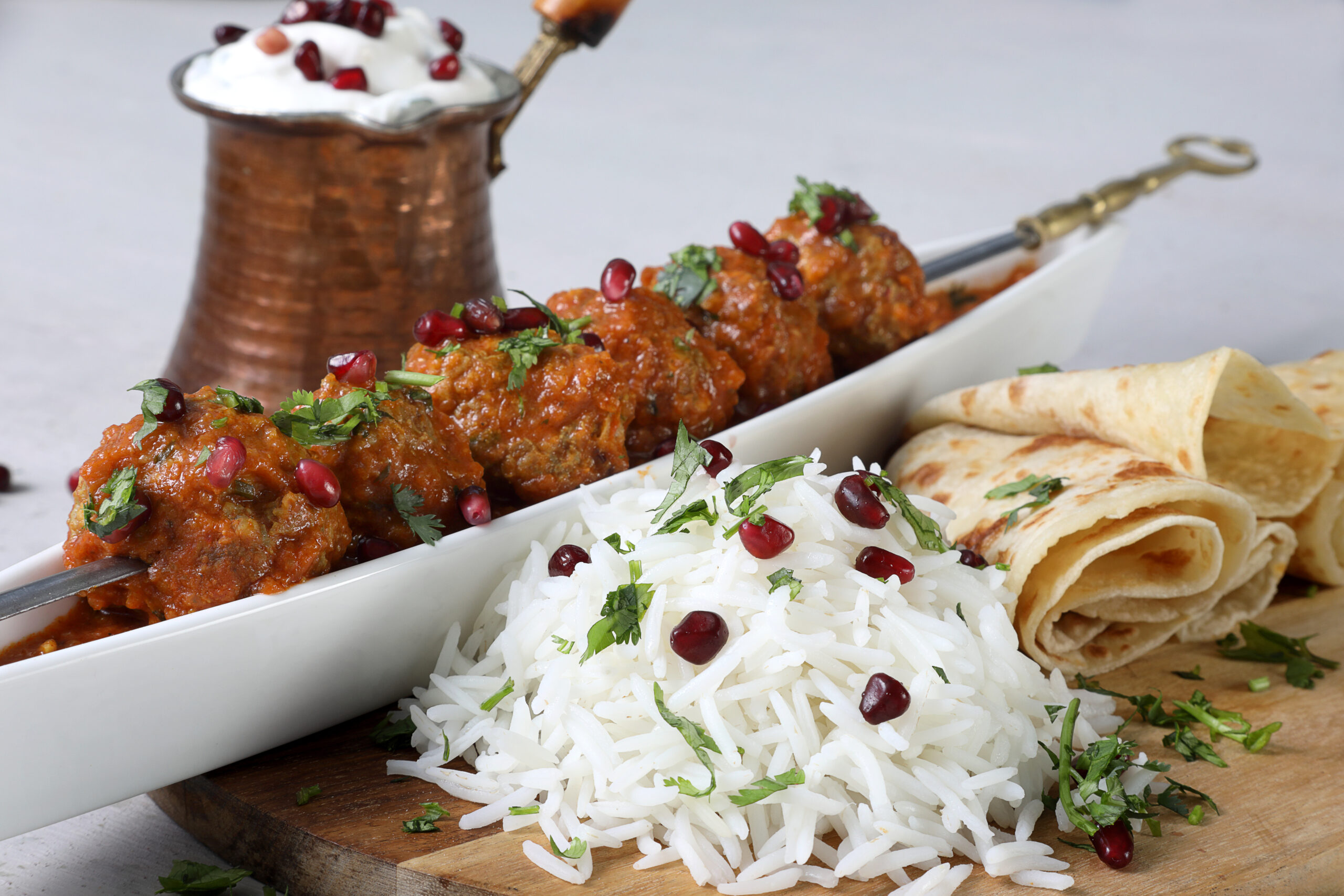 Lamb Kebab Curry with Pomegranate Raita - Golden Delight